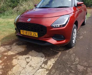 Vooraanzicht van een huurauto Suzuki Swift in Mauritius, Mauritius ✓ Auto #13069. ✓ Transmissie Automatisch TM ✓ 0 beoordelingen.
