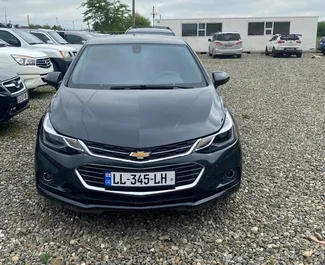 Vooraanzicht van een huurauto Chevrolet Cruze in Koetaisi, Georgië ✓ Auto #7032. ✓ Transmissie Automatisch TM ✓ 0 beoordelingen.