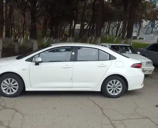 Vooraanzicht van een huurauto Toyota Corolla Sedan in Bakoe, Azerbeidzjan ✓ Auto #13511. ✓ Transmissie Automatisch TM ✓ 0 beoordelingen.