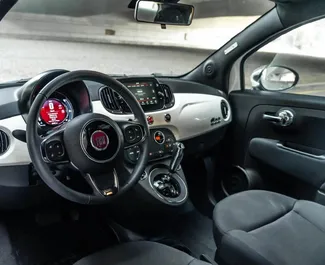 Autohuur Fiat 500 2024 in in de VAE, met Benzine brandstof en 70 pk ➤ Vanaf 180 AED per dag.