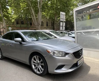 Interieur van Mazda 6 te huur in Georgië. Een geweldige auto met 5 zitplaatsen en een Automatisch transmissie.