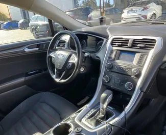 Ford Fusion Sedan 2014 beschikbaar voor verhuur in Tbilisi, met een kilometerlimiet van onbeperkt.