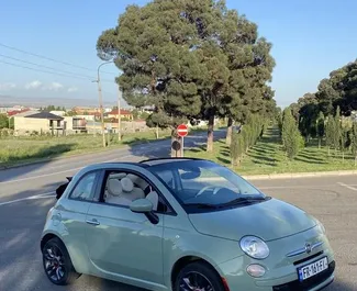 Vooraanzicht van een huurauto Fiat 500 Cabrio in Tbilisi, Georgië ✓ Auto #12316. ✓ Transmissie Automatisch TM ✓ 0 beoordelingen.