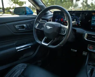 Ford Mustang Cabrio 2024 beschikbaar voor verhuur in Batumi, met een kilometerlimiet van 200 km/dag.