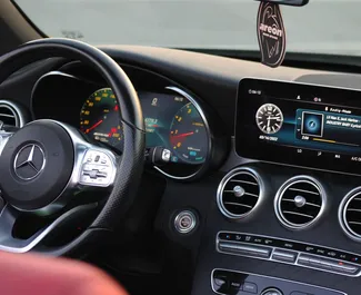 Autohuur Mercedes-Benz C300 Cabrio 2022 in in de VAE, met Benzine brandstof en 255 pk ➤ Vanaf 425 AED per dag.