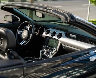 Ford Mustang Cabrio 2019 beschikbaar voor verhuur in Batumi, met een kilometerlimiet van 200 km/dag.