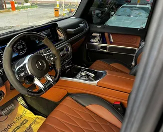 Autohuur Mercedes-Benz G63 AMG 2024 in in de VAE, met Benzine brandstof en 585 pk ➤ Vanaf 1600 AED per dag.