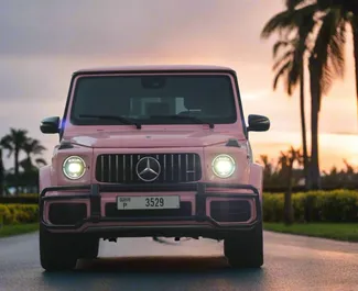 Vooraanzicht van een huurauto Mercedes-Benz G63 AMG in Dubai, Verenigde Arabische Emiraten ✓ Auto #13486. ✓ Transmissie Automatisch TM ✓ 0 beoordelingen.