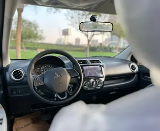 Vooraanzicht van een huurauto Mitsubishi Attrage in Dubai, Verenigde Arabische Emiraten ✓ Auto #13324. ✓ Transmissie Automatisch TM ✓ 0 beoordelingen.