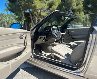 BMW 120d Cabrio 2010 beschikbaar voor verhuur in Alicante, met een kilometerlimiet van 250 km/dag.