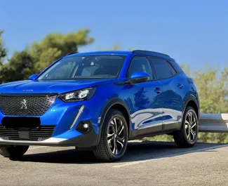 Vooraanzicht van een huurauto Peugeot 2008 in Budva, Montenegro ✓ Auto #14083. ✓ Transmissie Automatisch TM ✓ 0 beoordelingen.