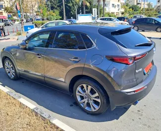 Vooraanzicht van een huurauto Mazda CX-30 in Limassol, Cyprus ✓ Auto #13931. ✓ Transmissie Automatisch TM ✓ 0 beoordelingen.
