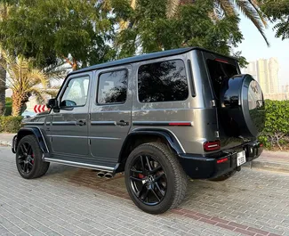 Autohuur Mercedes-Benz G63 2023 in in de VAE, met Benzine brandstof en 577 pk ➤ Vanaf 1700 AED per dag.