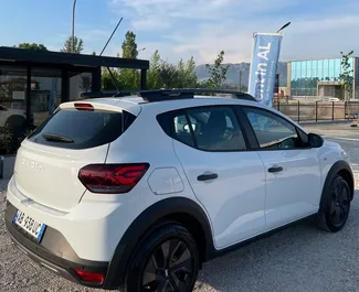 Dacia Sandero Stepway 2025 beschikbaar voor verhuur op de luchthaven van Tirana, met een kilometerlimiet van onbeperkt.