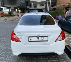 Autohuur Nissan Sunny 2024 in in de VAE, met Benzine brandstof en 110 pk ➤ Vanaf 47 AED per dag.
