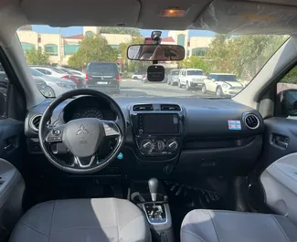 Vooraanzicht van een huurauto Mitsubishi Attrage in Dubai, Verenigde Arabische Emiraten ✓ Auto #11619. ✓ Transmissie Automatisch TM ✓ 0 beoordelingen.