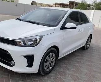 Vooraanzicht van een huurauto Kia Pegas in Dubai, Verenigde Arabische Emiraten ✓ Auto #14002. ✓ Transmissie Automatisch TM ✓ 0 beoordelingen.