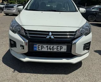 Vooraanzicht van een huurauto Mitsubishi Attrage in Tbilisi, Georgië ✓ Auto #13659. ✓ Transmissie Automatisch TM ✓ 0 beoordelingen.