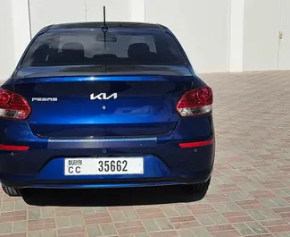 Vooraanzicht van een huurauto Kia Pegas in Dubai, Verenigde Arabische Emiraten ✓ Auto #14004. ✓ Transmissie Automatisch TM ✓ 0 beoordelingen.
