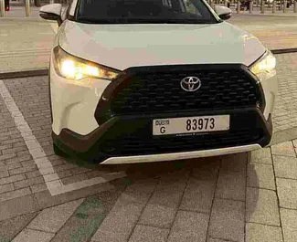 Autohuur Toyota Corolla Cross 2023 in in de VAE, met Benzine brandstof en 196 pk ➤ Vanaf 67 AED per dag.