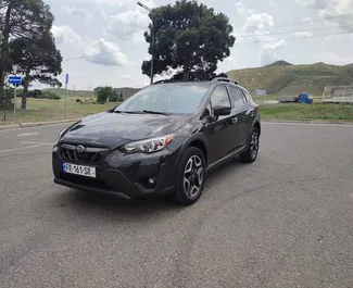 Vooraanzicht van een huurauto Subaru Crosstrek in Tbilisi, Georgië ✓ Auto #13668. ✓ Transmissie Automatisch TM ✓ 0 beoordelingen.