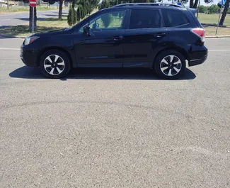 Vooraanzicht van een huurauto Subaru Forester in Tbilisi, Georgië ✓ Auto #13669. ✓ Transmissie Automatisch TM ✓ 0 beoordelingen.