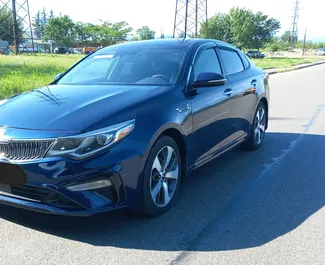 Vooraanzicht van een huurauto Kia Optima in Koetaisi, Georgië ✓ Auto #14150. ✓ Transmissie Automatisch TM ✓ 0 beoordelingen.