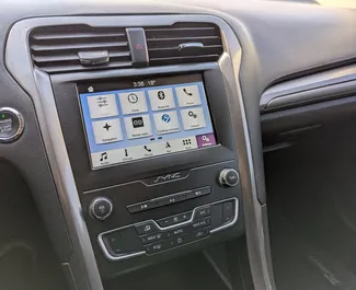 Autohuur Ford Fusion Sedan 2020 in in Georgië, met Hybride brandstof en 149 pk ➤ Vanaf 140 GEL per dag.