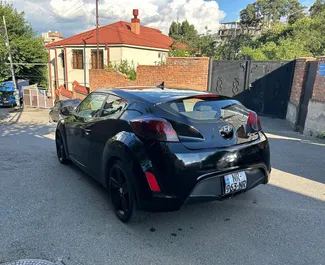 Hyundai Veloster 2015 met Vooraandrijving systeem, beschikbaar in Tbilisi.