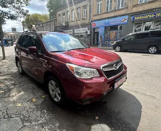 Vooraanzicht van een huurauto Subaru Forester in Koetaisi, Georgië ✓ Auto #14396. ✓ Transmissie Automatisch TM ✓ 0 beoordelingen.