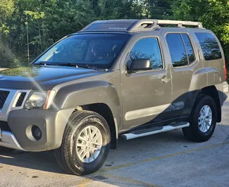 Vooraanzicht van een huurauto Nissan X-Terra in Koetaisi, Georgië ✓ Auto #14472. ✓ Transmissie Automatisch TM ✓ 0 beoordelingen.