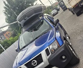 Vooraanzicht van een huurauto Nissan X-Terra in Koetaisi, Georgië ✓ Auto #14470. ✓ Transmissie Automatisch TM ✓ 0 beoordelingen.