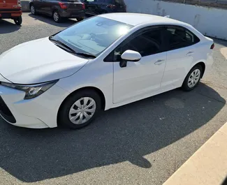 Autohuur Toyota Corolla Sedan 2024 in in Cyprus, met Hybride brandstof en 145 pk ➤ Vanaf 29 EUR per dag.