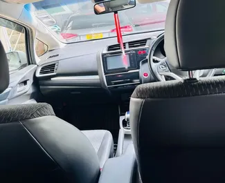 Vooraanzicht van een huurauto Honda Fit in Mauritius, Mauritius ✓ Auto #14452. ✓ Transmissie Automatisch TM ✓ 0 beoordelingen.
