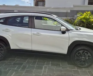 Vooraanzicht van een huurauto Suzuki Fronx op Mauritius Luchthaven, Mauritius ✓ Auto #14562. ✓ Transmissie Automatisch TM ✓ 0 beoordelingen.