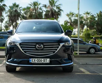 Vooraanzicht van een huurauto Mazda CX-9 in Batumi, Georgië ✓ Auto #14451. ✓ Transmissie Automatisch TM ✓ 0 beoordelingen.
