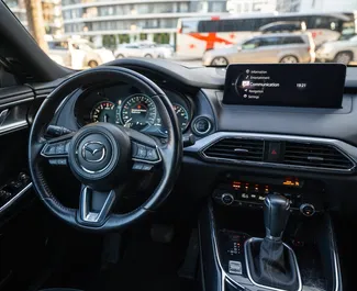 Mazda CX-9 2023 beschikbaar voor verhuur in Batumi, met een kilometerlimiet van 300 km/dag.