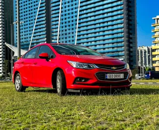 Vooraanzicht van een huurauto Chevrolet Cruze in Tbilisi, Georgië ✓ Auto #14544. ✓ Transmissie Automatisch TM ✓ 0 beoordelingen.