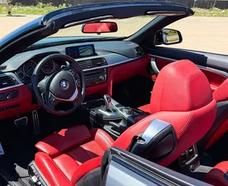 BMW 430i Cabrio 2019 beschikbaar voor verhuur in Tbilisi, met een kilometerlimiet van onbeperkt.
