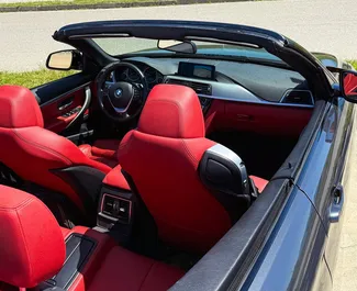 Interieur van BMW 430i Cabrio te huur in Georgië. Een geweldige auto met 4 zitplaatsen en een Automatisch transmissie.
