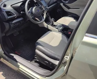 Interieur van Subaru Forester te huur in Georgië. Een geweldige auto met 5 zitplaatsen en een Automatisch transmissie.