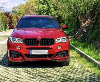 Vooraanzicht van een huurauto BMW X6 in Tbilisi, Georgië ✓ Auto #14539. ✓ Transmissie Automatisch TM ✓ 0 beoordelingen.