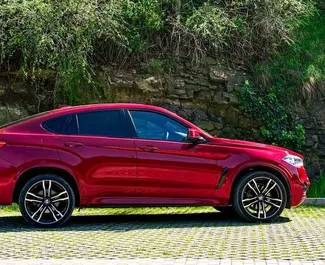 Autohuur BMW X6 2015 in in Georgië, met Benzine brandstof en 306 pk ➤ Vanaf 275 GEL per dag.