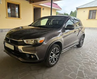 Vooraanzicht van een huurauto Mitsubishi Outlander Sport in Tbilisi, Georgië ✓ Auto #11608. ✓ Transmissie Automatisch TM ✓ 0 beoordelingen.