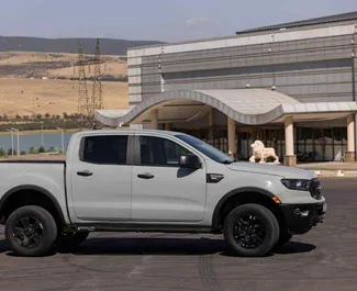 Vooraanzicht van een huurauto Ford Ranger in Tbilisi, Georgië ✓ Auto #14757. ✓ Transmissie Automatisch TM ✓ 0 beoordelingen.