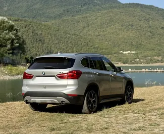Verhuur BMW X1. Comfort, Premium, Crossover Auto te huur in Georgië ✓ Borg van Zonder Borg ✓ Verzekeringsmogelijkheden TPL, CDW, SCDW, FDW, Passagiers.