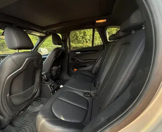 BMW X1 2016 beschikbaar voor verhuur in Tbilisi, met een kilometerlimiet van onbeperkt.