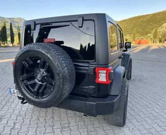 Jeep Wrangler 2021 beschikbaar voor verhuur in Tbilisi, met een kilometerlimiet van 200 km/dag.
