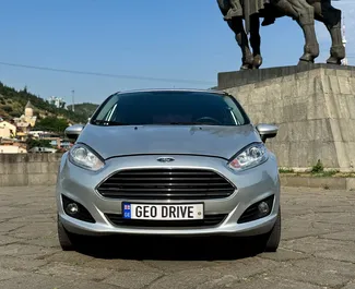 Vooraanzicht van een huurauto Ford Fiesta in Tbilisi, Georgië ✓ Auto #7554. ✓ Transmissie Automatisch TM ✓ 1 beoordelingen.