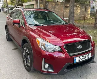 Vooraanzicht van een huurauto Subaru XV in Tbilisi, Georgië ✓ Auto #14753. ✓ Transmissie Automatisch TM ✓ 1 beoordelingen.